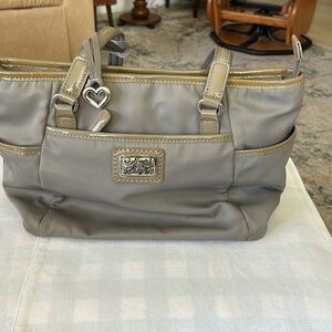 Brighton F402368 13 by 9 by 4” cloth bag with Pat leather trim very clean